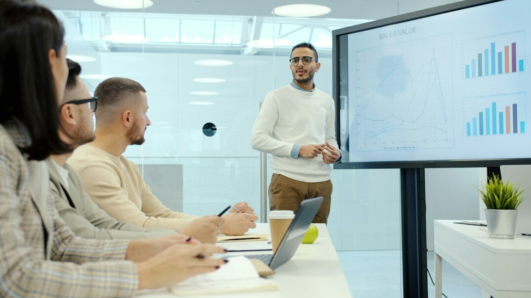man presenting in meeting